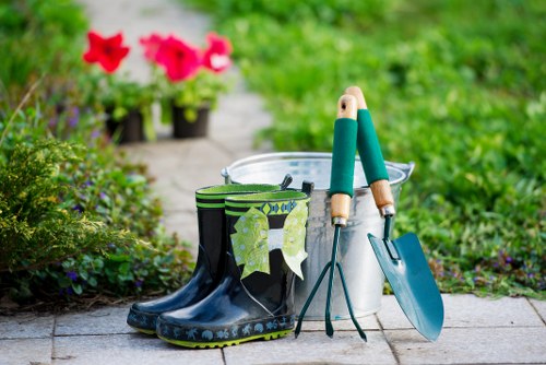 Landscaper loading garden waste in Yiewsley